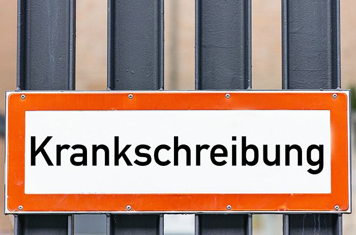 Zusatznutzen: Krankentage reduzieren Warnschild mit der Aufschrift 'Krankschreibung'.